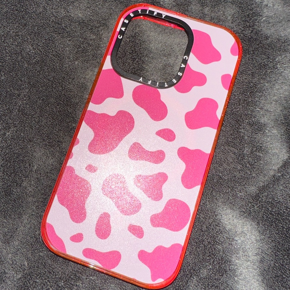 Casetify iPhone 14 Pro Pink Cow Print phone case